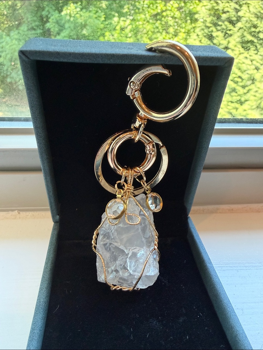 Gold Wire-Wrapped Clear Crystal bag charm.